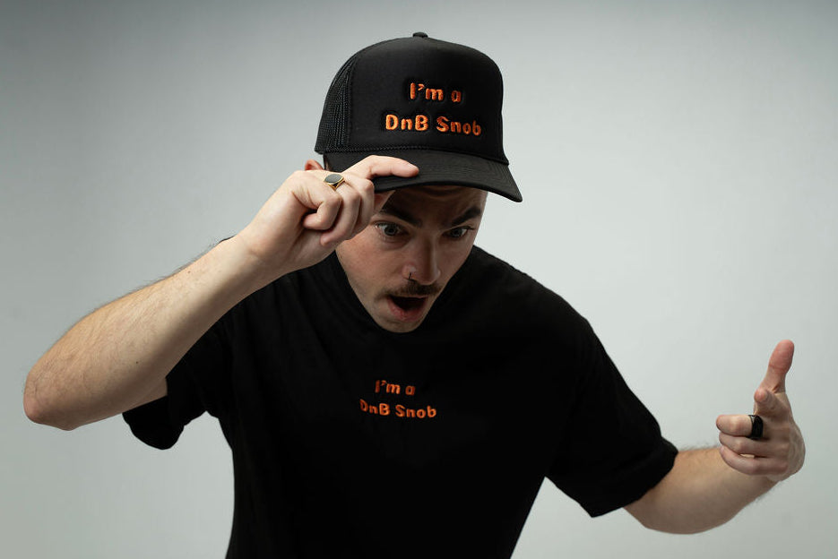 Trucker Hat with I'm a DnB Snob Embroidery