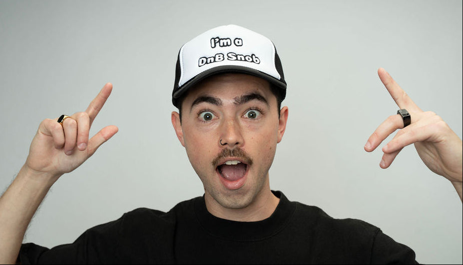Trucker Hat with I'm a DnB Snob Embroidery