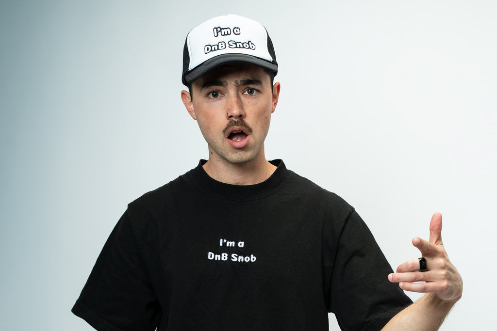 Trucker Hat with I'm a DnB Snob Embroidery